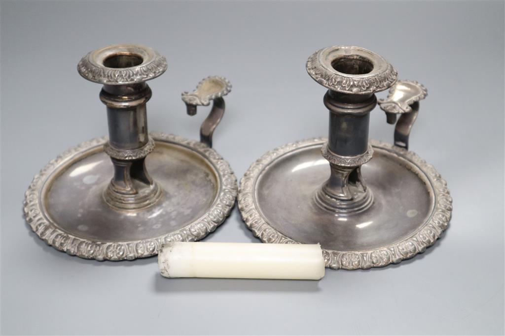 A pair of Victorian Old Sheffield plate chambersticks, 12cm